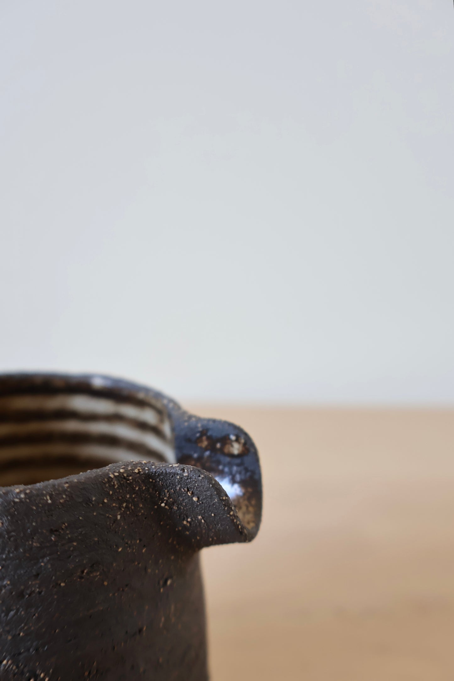 Detail of ceramic milk jug made in sweden