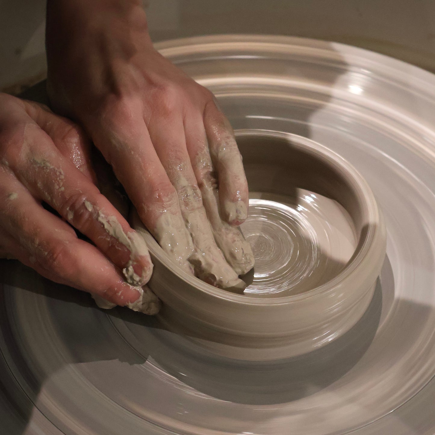 Beginner learning wheel-throwing workshop in Malmö at Ela Grima’s ceramics studio